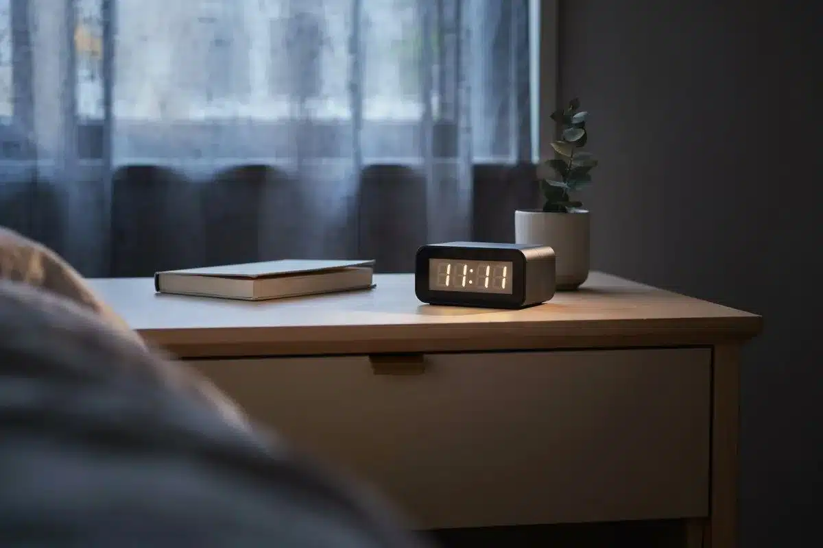 Repeated 1111 Number Sightings Digital bedside clock displaying 11:11 at dusk